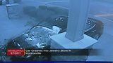 Video shows car slamming into local jewelry store